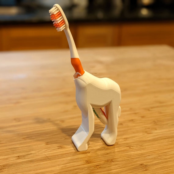 A variety of different toothbrush holder designs that could be used for the stop-motion rig