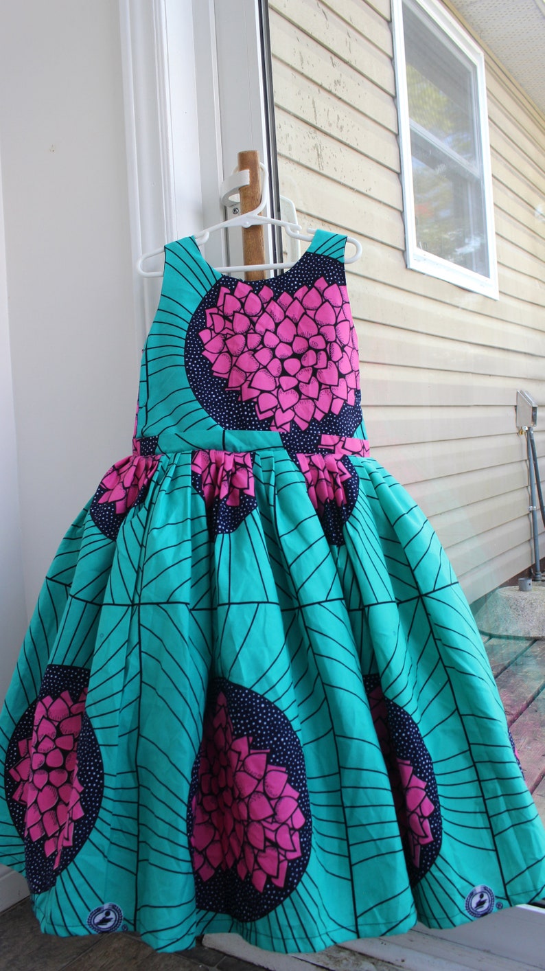 Beautiful Africa Prints Girl Dress with bow at the back and a head bow