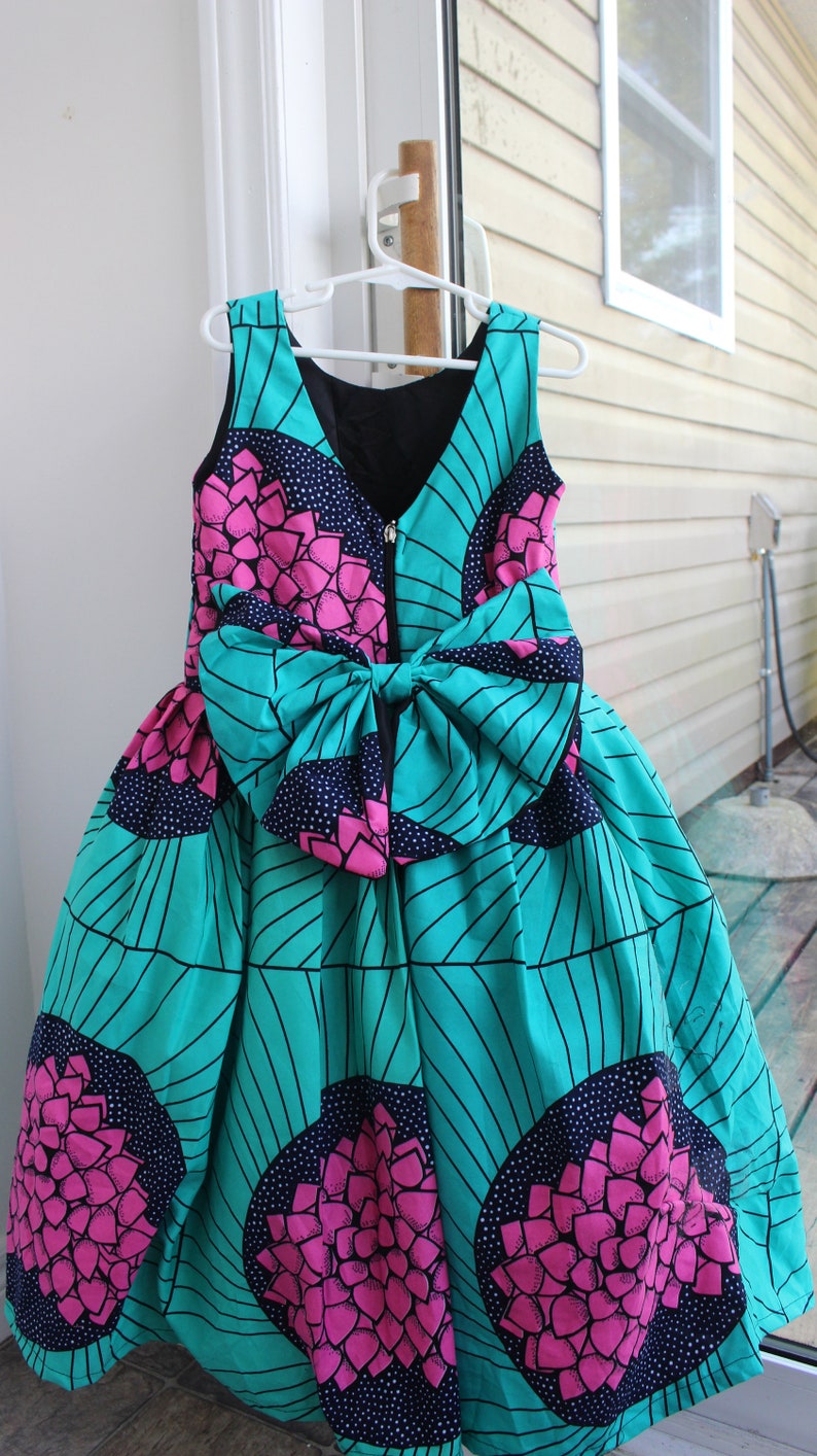 Beautiful Africa Prints Girl Dress with bow at the back and a head bow