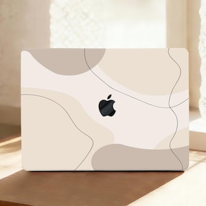 Funda rígida para MacBook con diseño de líneas onduladas y cubierta de goma con estampado abstracto en tonos pastel (protección superior e inferior).