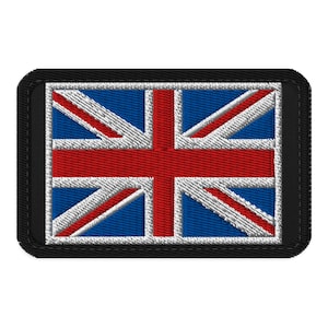 May include: A rectangular embroidered patch featuring the Union Jack flag design. The patch has a thick black border and displays the iconic red, white, and blue cross and diagonal stripes of the United Kingdom flag in a detailed stitched texture.