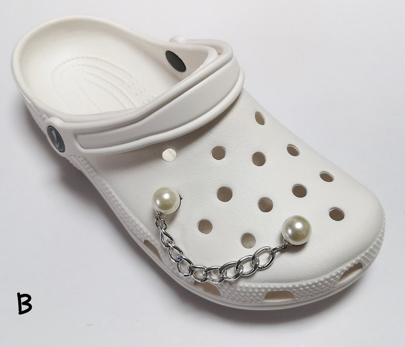 what stores sell charms for crocs