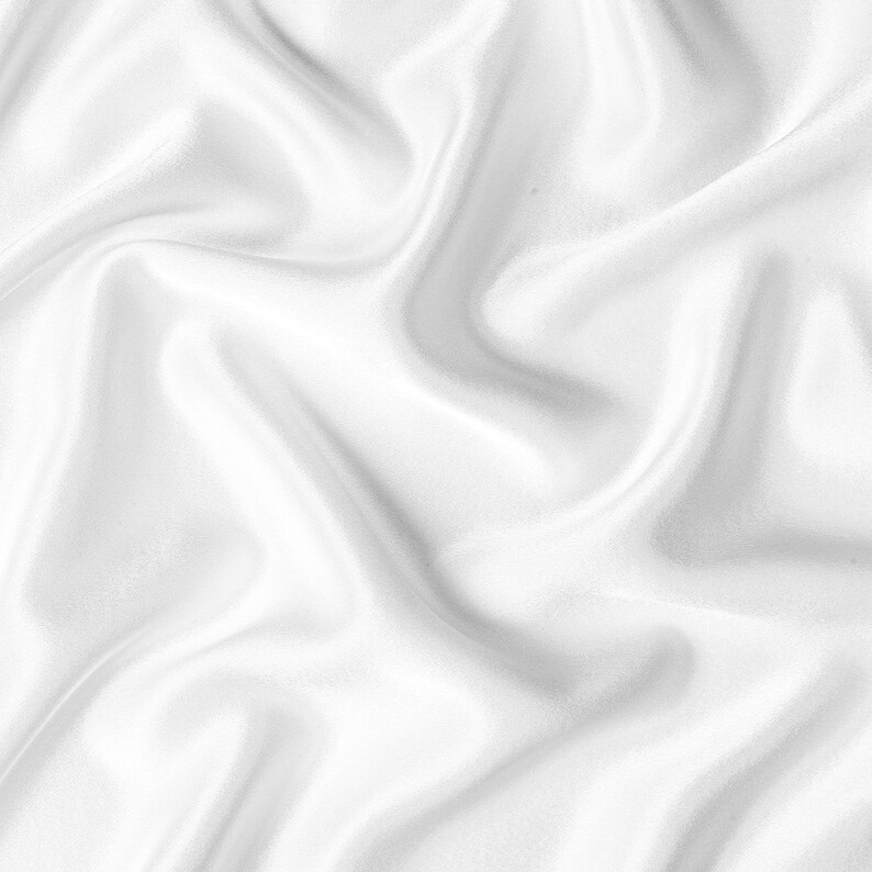 May include: White satin fabric with soft, flowing folds and wrinkles. The fabric is smooth and luxurious, with a subtle sheen.
