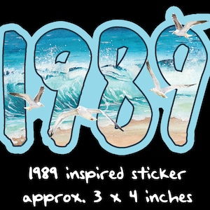 May include: A sticker with the year "1989" in light blue, featuring a beach scene inside the numbers and seagulls. The sticker is approximately 3 x 4 inches.