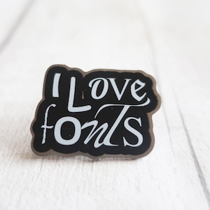I Love Fonts typographic pin badge, terrible fonts graphic design pin badge