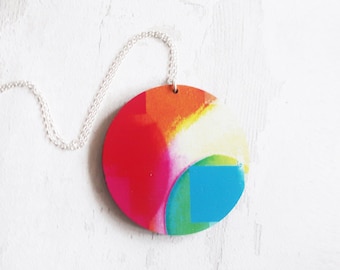 Statement graphic necklace, colourful round pendant