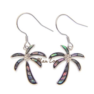 May include: A pair of silver earrings featuring a palm tree design. The palm trees are made of iridescent abalone shell pieces.