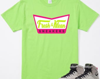Fräsch och ren tröja som matchar AJ 7 Tennis Day-sneakern, Jordan 7s Retro Tennis Day Phantom Lime, matchande t-shirt i rosa och antracit