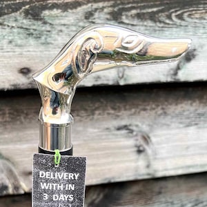 Add a Touch of Elegance to Your Walks with Our Foldable Black Wooden Walking Stick with Silver Dog Handle - A Unique and Stylish Accessory