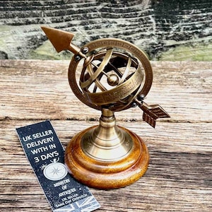 Vintage Armillary Sphere on Elegant Wooden Base: A Nostalgic Decor Accent for Your Home Décor Antique-Inspired Armillary Sphere