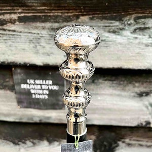 Stay Comfortable and Stylish with Our Silver Flower Carved Round Ball Handled Foldable Black Wooden Walking Stick - Adjustable Cane