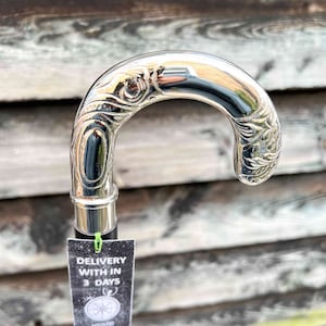 Classic Foldable Black Wooden Walking Stick with Silver Derby Handle - Timeless and Convenient Support for Your Daily Walks