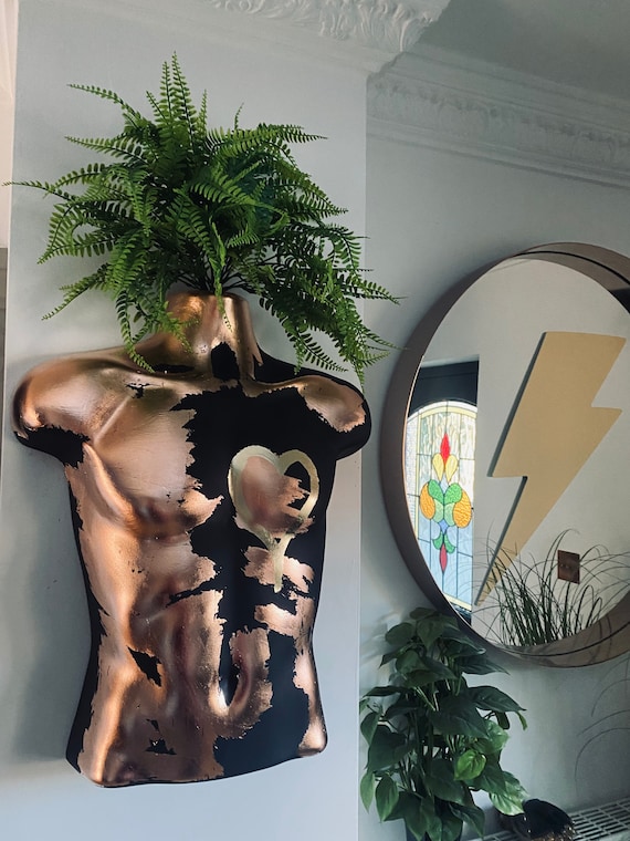 Male Wall Torso Boobie Artificial Plant Holder Black with copper leaf and a gold leaf heart