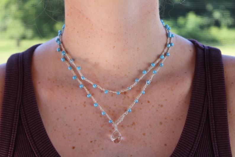 layered beaded crochet necklace with light blue beads