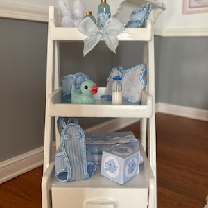 Dollhouse miniatures. 1/12 scale furniture for a baby&#39;s room.