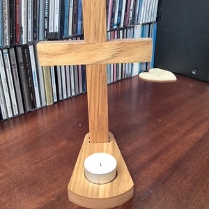 Christian cross with candle holder base image 1