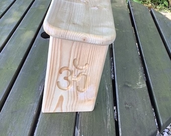 Folding meditation/prayer stool with Om symbol carving on both legs