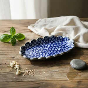Small oval ceramic plate, blue flower design, hand-thrown, suitable as a jewelry dish, soap dish, spice dish, wasabi ginger plate, or ring plate.