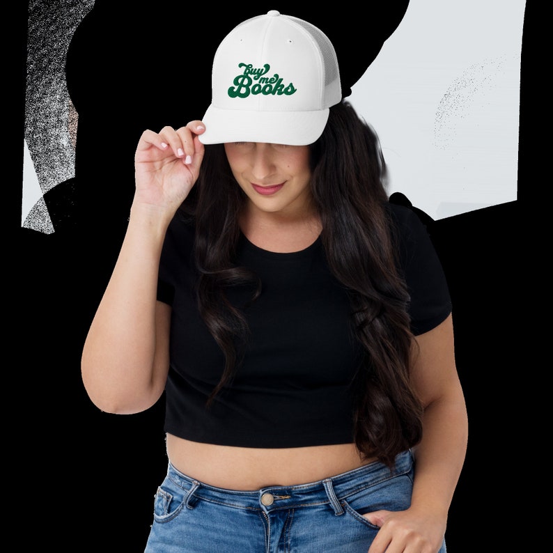 May include: White trucker hat with a green and white logo that says "Buy me Books".