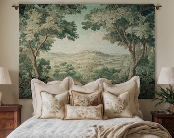May include: A bedroom scene featuring a bed with a white quilted comforter and decorative pillows. A tapestry depicting a landscape with trees hangs above the bed. Two wooden nightstands with lamps flank the bed. The text "JOY OF PLANTS Fine Art Home Decor" is visible.