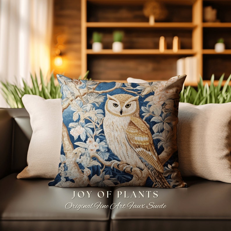 May include: A decorative throw pillow with a blue background featuring a white owl perched on a branch with yellow and white flowers. The text "JOY OF PLANTS" and "Original Fine Art Faux Suede" is printed below the image.