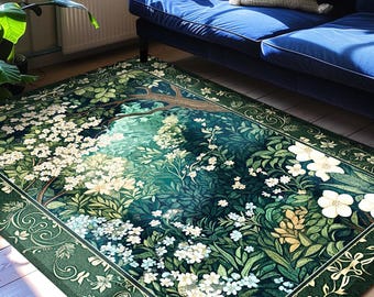 May include: A rectangular rug with a botanical design. The rug has a dark green border with white floral patterns. The central design depicts a forest scene with white flowers, green foliage, and a tree. The text "JOY OF PLANTS Original Fine Art Rugs" is visible.