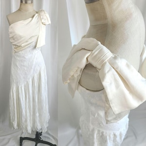cotton wool and silk white dress used Dress 1795-1800, possibly America Cotton muslin, silver wire, and silk taffeta The Museum at FIT