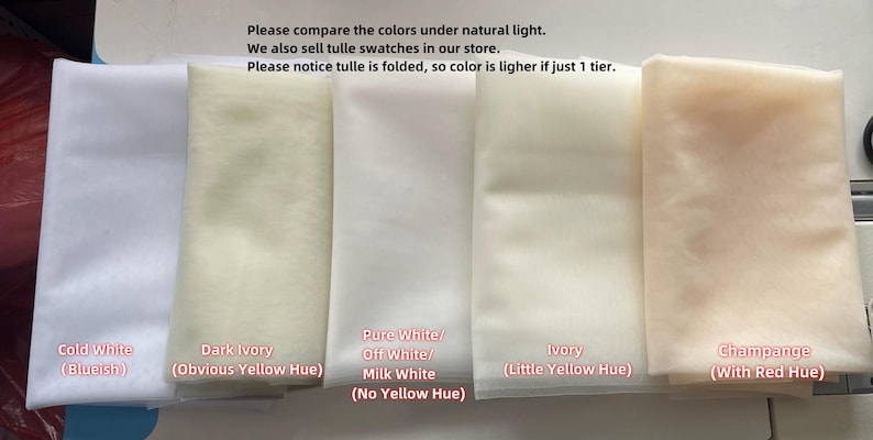 May include: Five swatches of tulle fabric in different colors: cold white, dark ivory, pure white, ivory, and champagne. The text below each swatch describes the color and any undertones.
