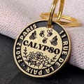 Personalized Brass Dog Tag – Deep Engraved Pet ID Tag for Dog or Cat – Custom Name Tag – Durable, Premium Quality product logo