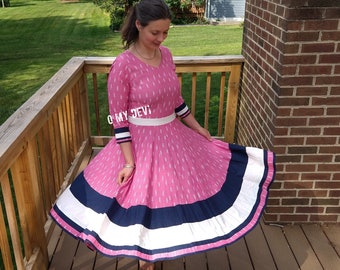 pink dress with cherries