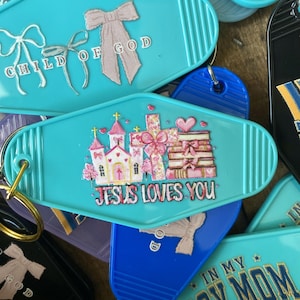 motel keychain. Jesus loves you keychain. Christian keychain. custom keychains. custom gifts. Christian gifts
