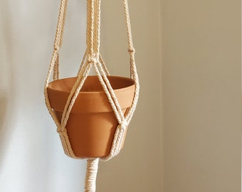 Macrame Plant Hanger. Holds 7-10" pot.