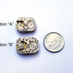 Peut inclure: Deux petits mouvements de montre argent&eacute;s, &eacute;tiquet&eacute;s "Option A" et "Option B", sont pr&eacute;sent&eacute;s &agrave; c&ocirc;t&eacute; d'une pi&egrave;ce de dix cents am&eacute;ricaine pour l'&eacute;chelle. Les mouvements sont complexes et d&eacute;taill&eacute;s, avec des engrenages et des ressorts visibles.
