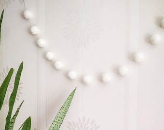 White pom pom garland for mantle, Neutral baby nursery decor, Ivory yarn Christmas garland, Bedroom over the bed wall decor, Boho bunting