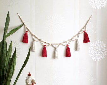 Red white Christmas mantle garland, Bedroom wall decor over the bed, Boho wood bead yarn wall hanging, Winter tassel bunting for window