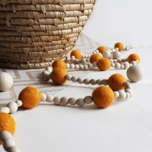 White felt ball wood bead garland for mantle, Boho bedroom wall decor over the bed, Hygge Christmas tree garland, Ivory wool pom pom bunting 5 – ochre