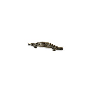 May include: A gold-toned metal pin shaped like the Sydney Harbour Bridge.