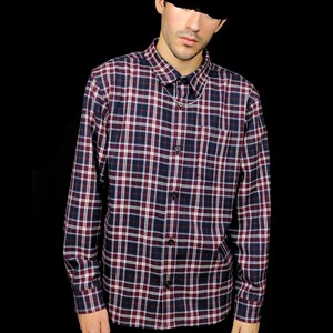 May include: A long-sleeved plaid shirt with a red, white and blue pattern. The shirt has a button-down collar and a chest pocket.