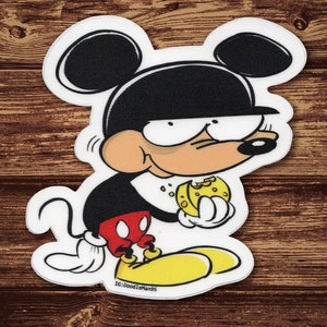 May include: A black and white cartoon illustration of Mickey Mouse wearing a black hat and holding a yellow cheese wedge. The image is on a white background.