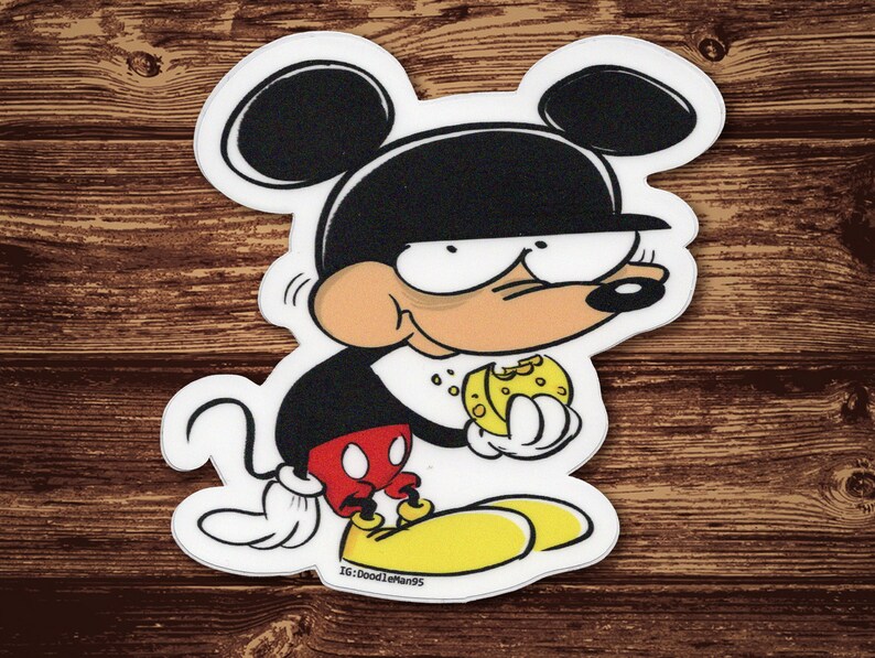 May include: A black and white cartoon illustration of Mickey Mouse wearing a black hat and holding a yellow cheese wedge. The image is on a white background.