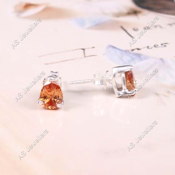 Peach sapphire stud best sale earrings