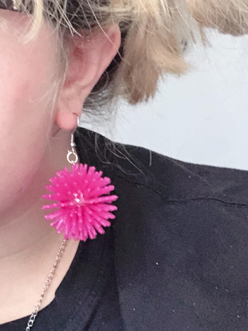 purple spiky earrings