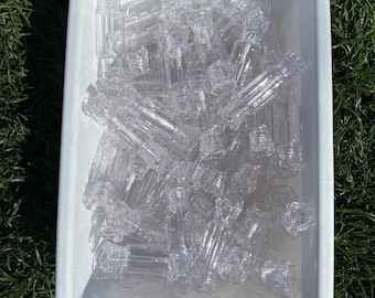 Tubos vacíos de brillo labial de caramelo