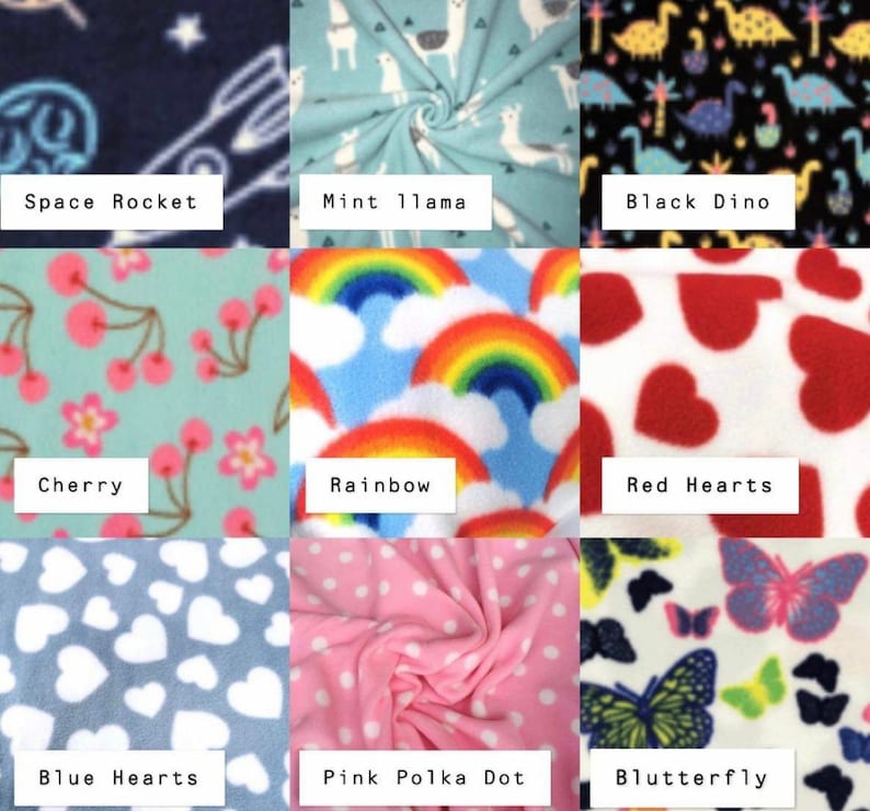 May include: A grid of nine fabric swatches featuring various patterns: Space Rocket, Mint Llama, Black Dino, Cherry, Rainbow, Red Hearts, Blue Hearts, Pink Polka Dot, and Blutterfly. Each swatch displays a distinct colorful print on fleece.