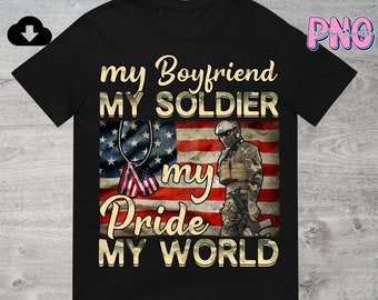 May include: Black t-shirt with a graphic of an American flag, a soldier, and the text "my Boyfriend my SOLDIER my Pride MY WORLD".