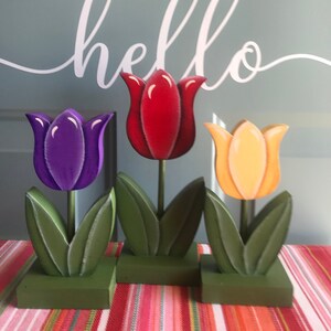 Wooden bright spring tulips. Hand painted set of three consists of one large and two small tulips.