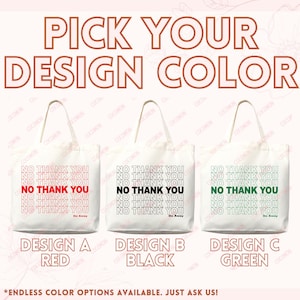 May include: Three white tote bags with the text "NO THANK YOU" in red, black, and green. The phrase "Go Away" is below the text. The words "PICK YOUR DESIGN COLOR" are at the top, with "DESIGN A RED", "DESIGN B BLACK", and "DESIGN C GREEN" below the bags.