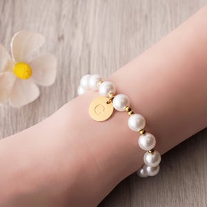 a close up of a person wearing a bracelet
