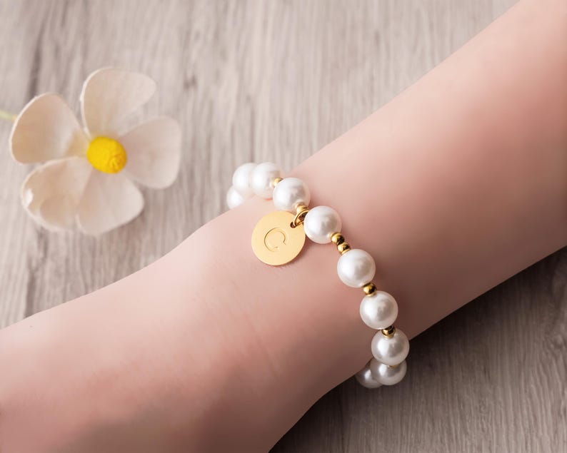 a close up of a person wearing a bracelet