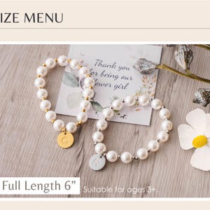 a full-length 6-inch bracelet made of white pearls, accompanied by a personalized message and a small flower.